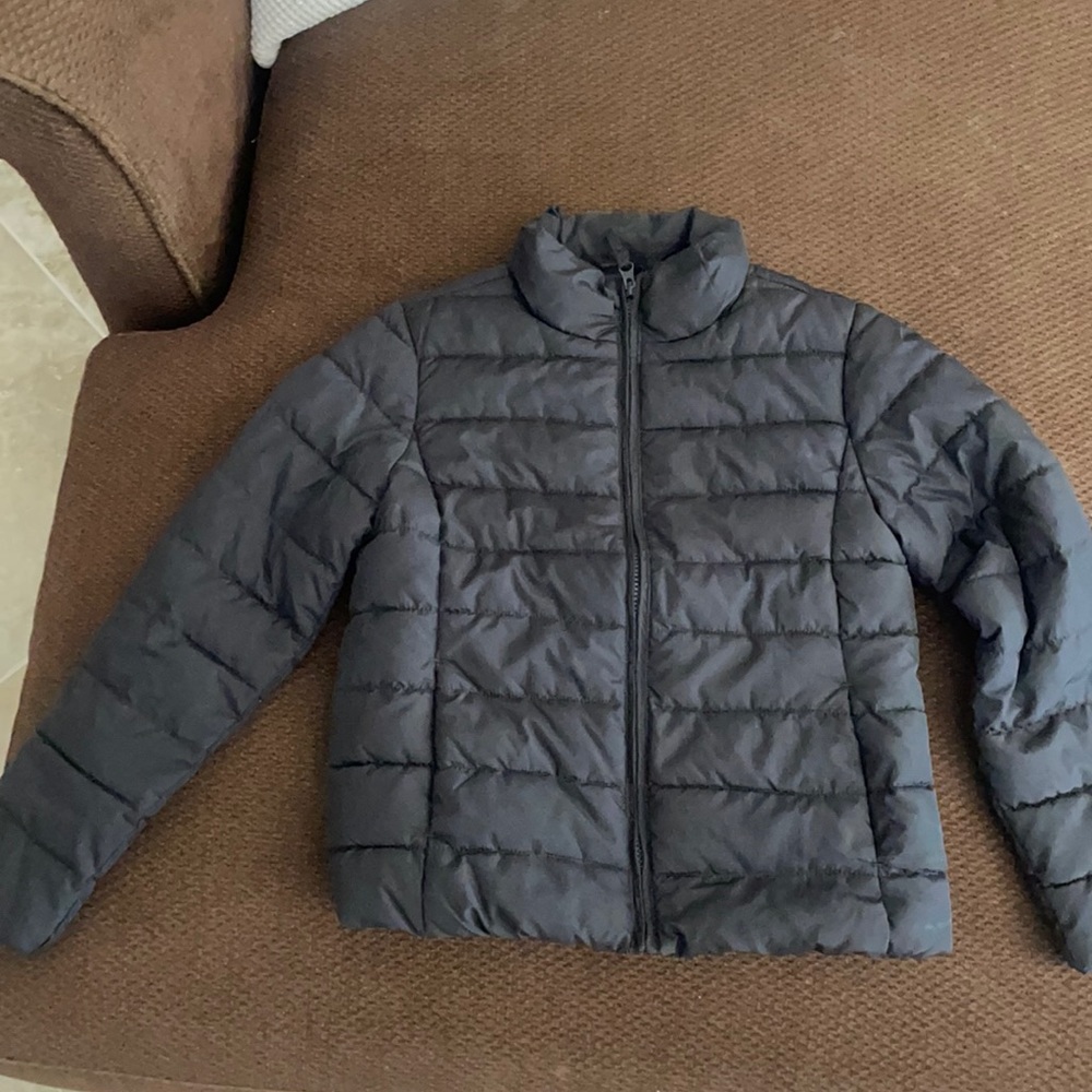 Girls black jacket size 10/12. Never worn